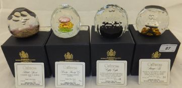 Four Caithness glass paperweights comprising "Shangri-La" No'd 58/150, "Eighty Eight" No'd 49/