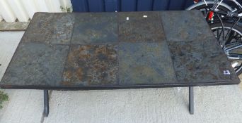 A slate top rectangular garden coffee table