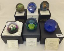 A collection of six Caithness glass paperweights - "Telstar", No'd. 256/750, "Encounter", No'd.