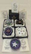 Five Selkirk Glass millefiore paperweights comprising "Basket Flower" No'd 13/100, "Flower & Bud"