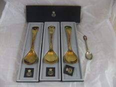 A collection of three cased Georg Jensen silver gilt collectors spoons,