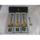 A collection of three cased Georg Jensen silver gilt collectors spoons,