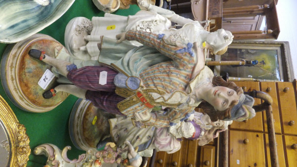 A pair of large Continental porcelain polychrome decorated biscuit ware figures bearing impressed - Image 2 of 7