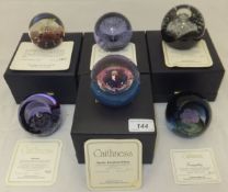 A collection of six Caithness glass paperweights - "Tranquillity", No'd. 201/750, "Atlantis", No'd.