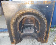 A Victorian cast iron fireplace
