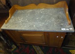 A marble topped mahogany washstand with single drawer and three quarter galleried top