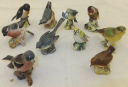 A collection of ten Beswick bird figures to include Goldfinch, No. 2273, Bullfinch, No.