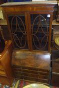 A mahogany bureau bookcase with astragal glazed doors,