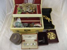 A box of assorted costume jewellery to include various necklaces, cufflinks, ear studs,