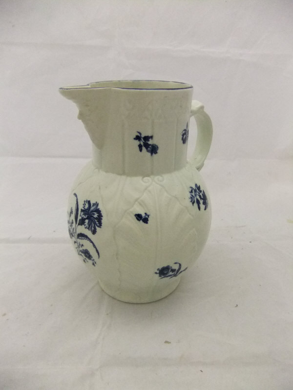 A large Caughley cabbage leaf moulded jug with mask head handle, decorated in underglaze blue with - Image 2 of 9