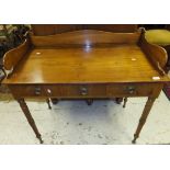 A 19th Century mahogany gallery top wash stand with frieze drawer,