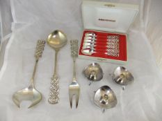 A collection of Danish silver and plated cutlery and candlesticks to include a pair of fish servers,