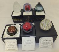 A collection of six Caithness glass paperweights - "Water Lilies", No'd. 212/250, "Virtue", No'd.