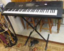 A Casio WK-1300 keyboard with Bespeco VM24 sustain pedal and stand