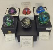 A collection of six Caithness glass paperweights - "Aquamarine", No'd. 186/350, "Aurora", No'd.