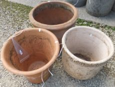 Two large terracotta planters,