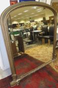 A Victorian giltwood and gesso framed dome top overmantel mirror