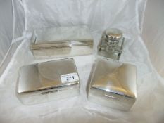 Three rectangular silver sheathed table cigarette boxes, one bearing inscription,