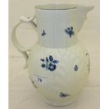 A large Caughley cabbage leaf moulded jug with mask head handle, decorated in underglaze blue with