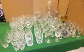 A large collection of various glass to include cut glass wines, decanter, scent bottles,