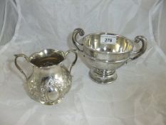 An Edwardian silver miniature rose bowl of typical form with scroll handles, inscribed "R.E.