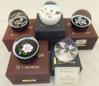 A collection of five Caithness Whitefriars glass paperweights - "Floral Whimsy", No'd. 36/500, "