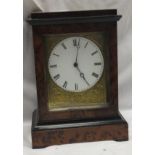 A burr cedar cased mantel clock with mechanism marked to back "VAP Brevete S.G.D.G" CONDITION