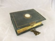 A Victorian leather bound musical photograph album,