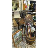 A coopered barrel decorated with copper fittings and handle, a brass standard lamp,