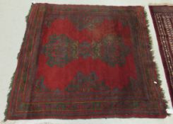 A Turkish Ushak rug, the two central linked medallions in green and blue on a red ground,