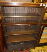 An oak open adjustable bookcase