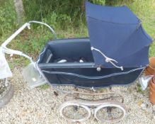 A 1960's Marmet coach built pram CONDITION REPORTS Generally in quite rusted and deteriorated