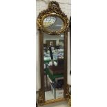 A gilt framed pier glass in the 19th Century Continental manner, together with another gilt framed