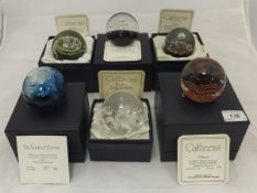 A collection of six Caithness glass paperweights - "Nocturne", No'd. 66/1000, "North Sea", No'd.