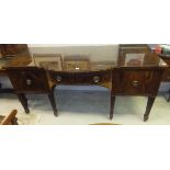 A Regency mahogany and inlaid breakfront sideboard,