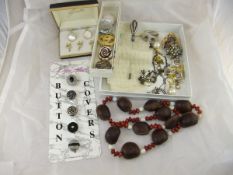 A box of assorted costume jewellery,