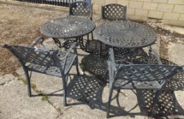 Four black painted metal garden chairs with lattice work style back and seats,