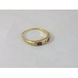 A ruby and diamond set 18 carat gold dress ring