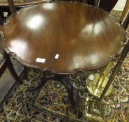 A 19th Century mahogany tea table in the Chippendale taste,