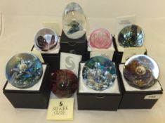 A collection of eight Selkirk Glass paperweights - "Fire Coral", No'd.