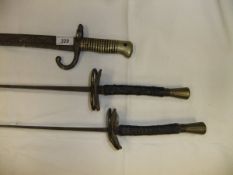 A brass handled bayonet, No'd.