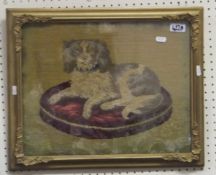 A 19th century needlework study of a spaniel upon cushion CONDITION REPORTS Quite a lot of fading