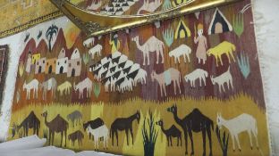 A Caucasian kelim rug decorated with shepherds and town at sunset with camels and goats in