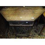 An 18th Century style oak credence table with single drawer,