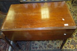 A 19th Century mahogany Pembroke table on turned supports to brown china castors CONDITION REPORTS