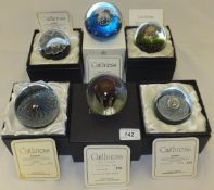 A collection of six Caithness glass paperweights - "Space Rose (Ruby)", No'd.