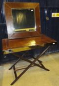 A modern metal framed and leather covered butler's tray style side table on X-frame base,