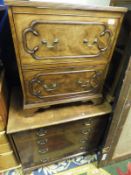 A 19th Century mahogany commode with applied decoration and brass handles,