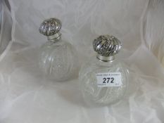 A pair of Victorian silver mounted cut glass grenade scent bottles (Chester 1894)