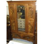 An art nouveau walnut wardrobe,